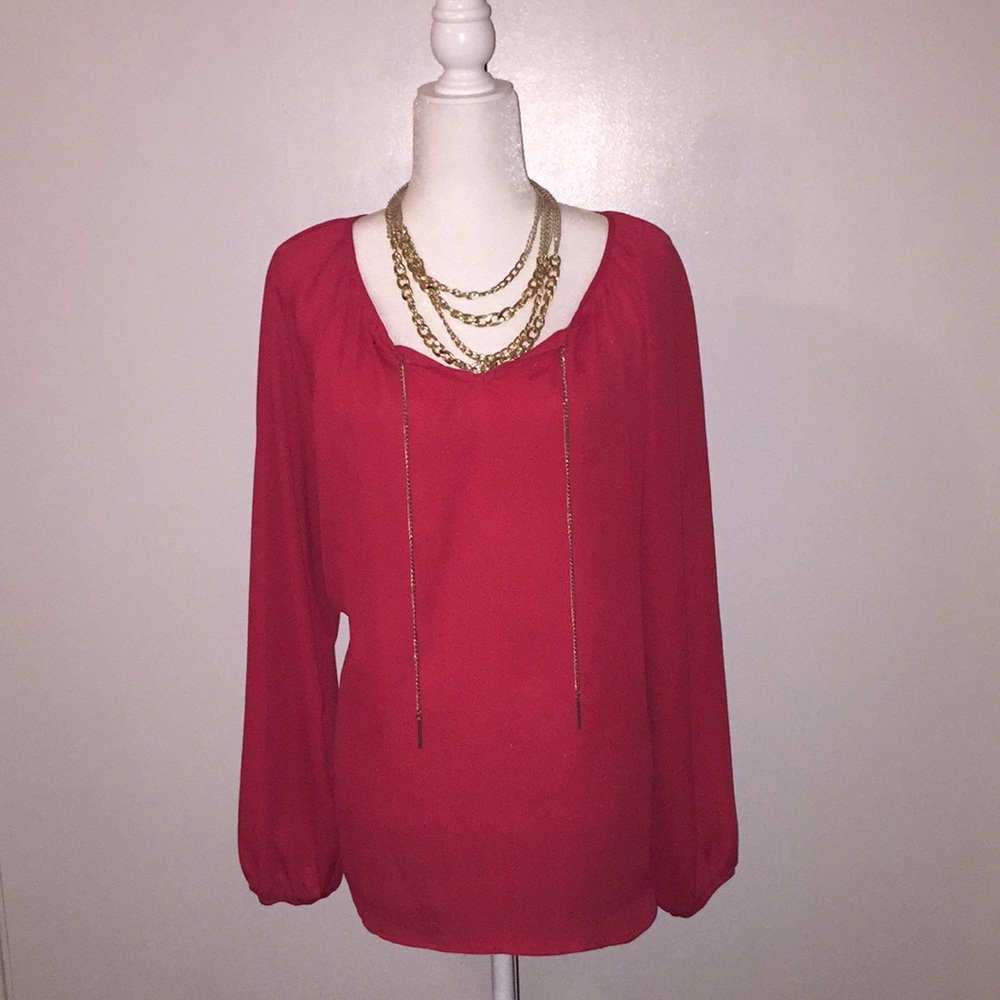 Red blouse with silver chain detail